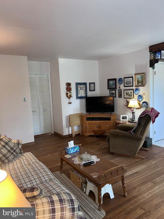  - living room with wood finished floors and baseboards