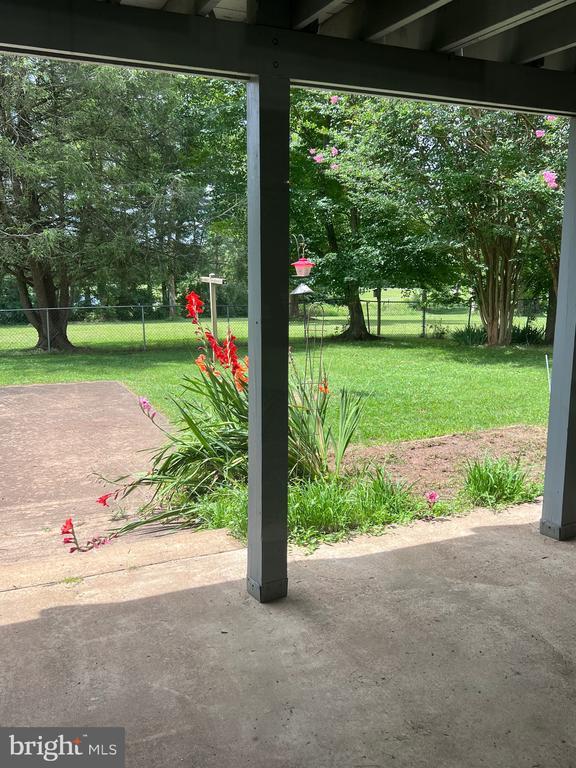  - view of yard with a patio