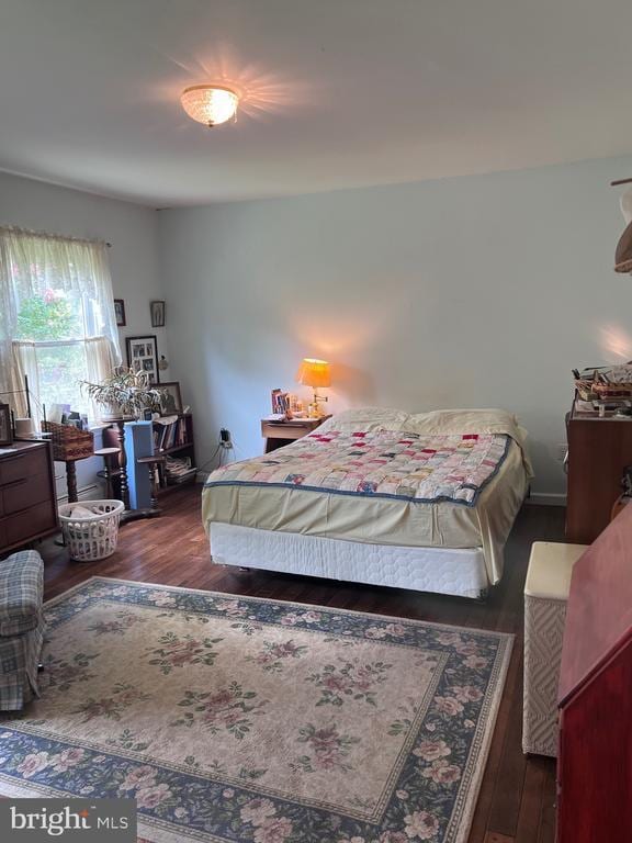  - bedroom with wood finished floors