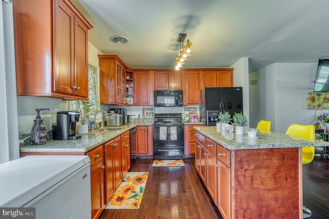 10119 Jameson Ln, Culpeper, VA 22701 - kitchen featuring black appliances, a sink, dark wood finished floors, and brown cabinets