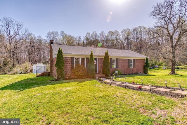 10119 Jameson Ln, Culpeper, VA 22701 - ranch-style house featuring a shed, a front yard, a chimney, and brick siding