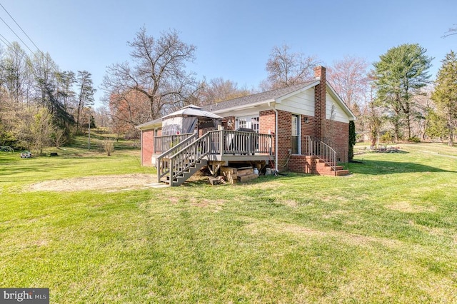 10119 Jameson Ln, Culpeper, VA 22701 - view of side of home with brick siding, a chimney, a wooden deck, and a lawn