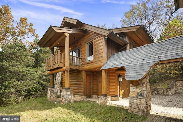 10312 US Highway 340n, Rileyville, VA 22650 - back of property with stone siding, a balcony, and a yard