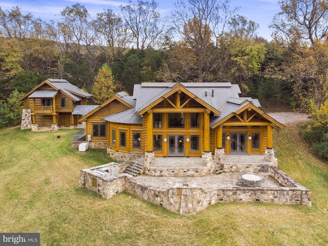 10312 US Highway 340n, Rileyville, VA 22650 - back of house with french doors, a lawn, and a forest view