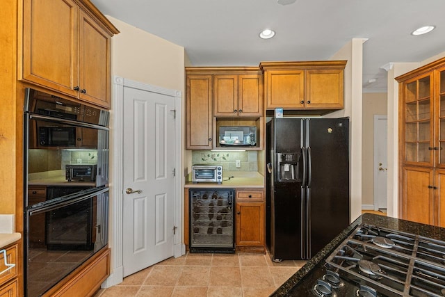 135 Meagans Run Rd, Woodstock, VA 22664 - kitchen with black appliances, wine cooler, tasteful backsplash, brown cabinets, and recessed lighting