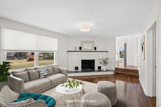 10304 Spotswood Trl, Mcgaheysville, VA 22840 - living area with wood finished floors, a fireplace, and baseboards