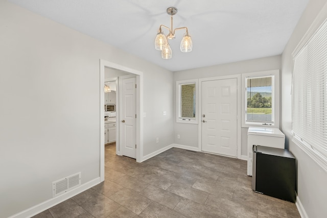 10304 Spotswood Trl, Mcgaheysville, VA 22840 - entryway with a chandelier and baseboards