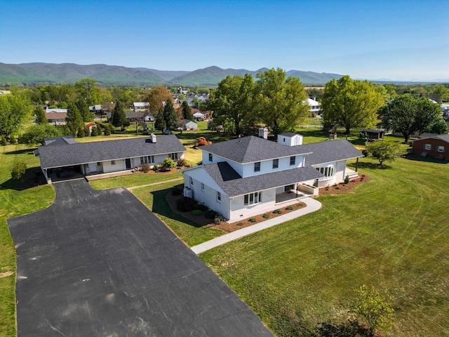 aerial view of residential area with a mountain backdrop
