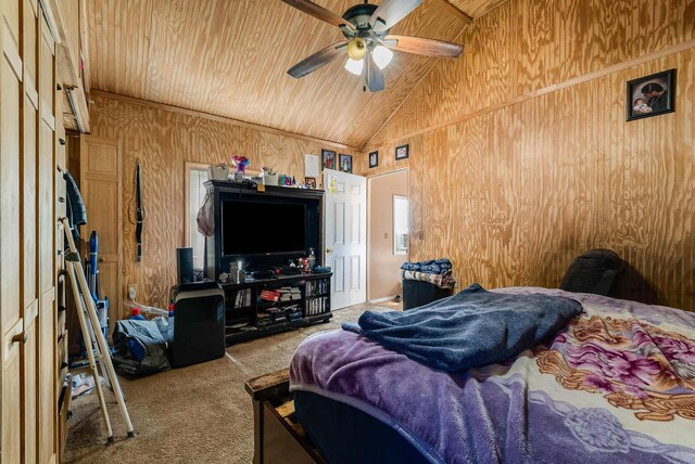 2015 Cecil Wampler Rd, Rockingham, VA 22841 - bedroom featuring wooden ceiling, carpet flooring, wood walls, high vaulted ceiling, and ceiling fan