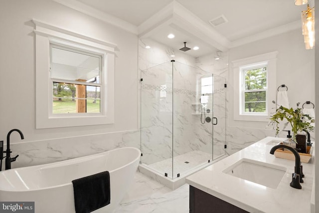  - bathroom with marble tiled flooring, a marble finish shower, recessed lighting, a freestanding tub, and double vanity