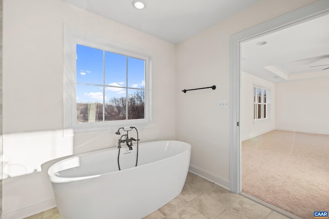 121 Yates Cir, Stanardsville, VA 22973 - bathroom featuring baseboards, recessed lighting, a freestanding bath, and a ceiling fan