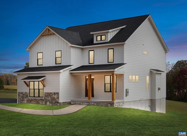 121 Yates Cir, Stanardsville, VA 22973 - modern farmhouse featuring a front lawn, a shingled roof, a porch, and board and batten siding
