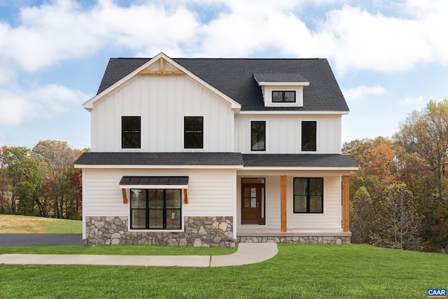 121 Yates Cir, Stanardsville, VA 22973 - view of front of home with a front lawn, board and batten siding, covered porch, and stone siding