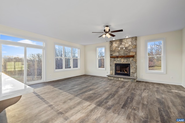 121 Yates Cir, Stanardsville, VA 22973 - unfurnished living room featuring dark wood-style floors, baseboards, and a ceiling fan