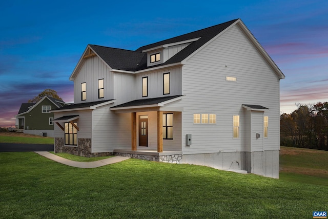 121 Yates Cir, Stanardsville, VA 22973 - view of front facade with a yard, covered porch, and board and batten siding