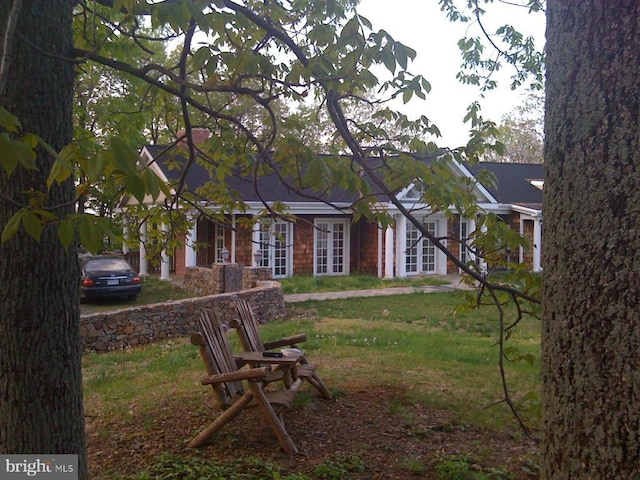  - view of front of property featuring french doors