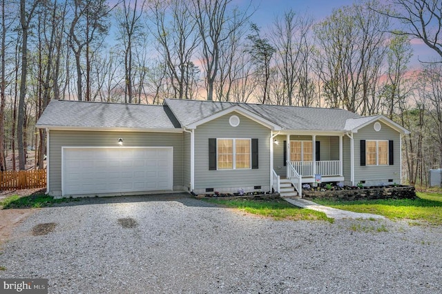ranch-style home with crawl space, a porch, driveway, a garage, and fence