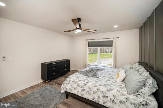 bedroom featuring dark wood-style floors, recessed lighting, baseboards, and a ceiling fan