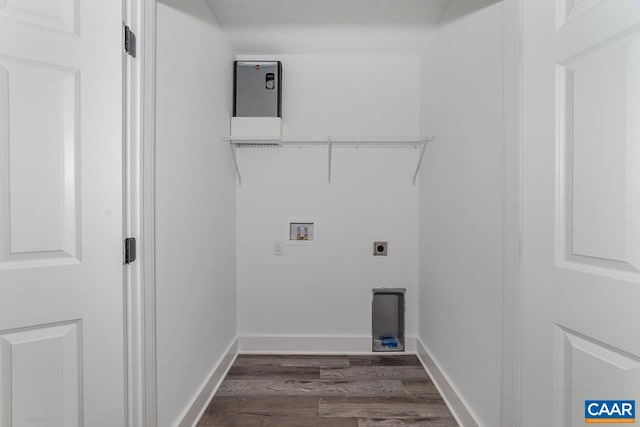 clothes washing area with laundry area, electric dryer hookup, washer hookup, and dark wood-type flooring