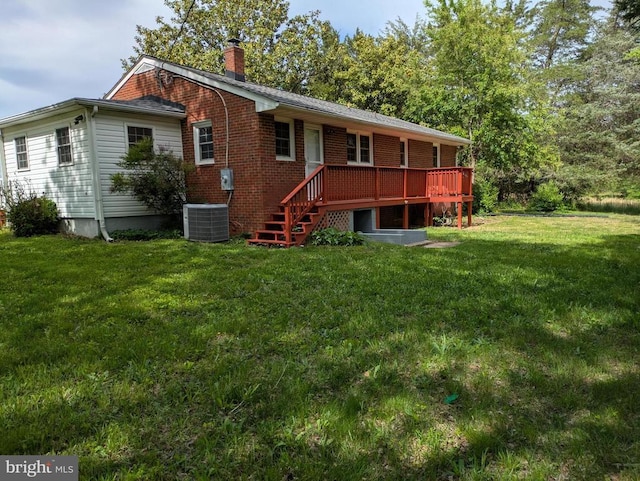 6461 Brokenburg Rd, Spotsylvania, VA 22551 - rear view of property featuring a yard, brick siding, a deck, and a chimney