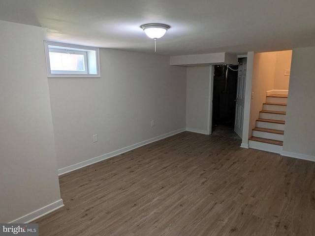 6461 Brokenburg Rd, Spotsylvania, VA 22551 - basement featuring wood finished floors, baseboards, and stairs