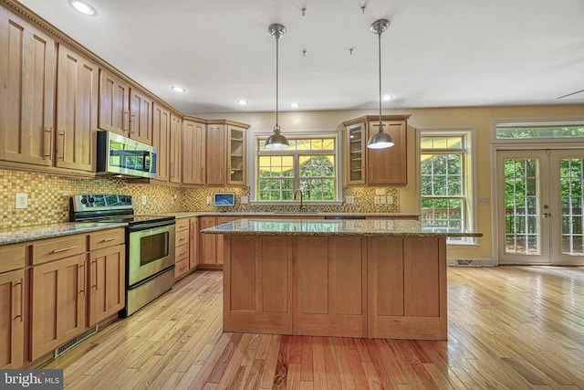 188 Byrd Point Ln, Louisa, VA 23093 - kitchen with stainless steel appliances, plenty of natural light, light wood-style flooring, and recessed lighting