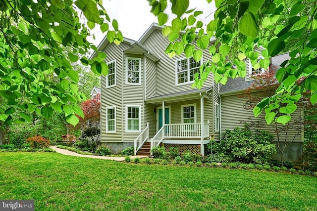 188 Byrd Point Ln, Louisa, VA 23093 - view of front of property featuring a porch and a front yard