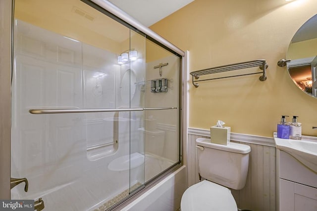 188 Byrd Point Ln, Louisa, VA 23093 - full bathroom featuring vanity, wainscoting, and combined bath / shower with glass door