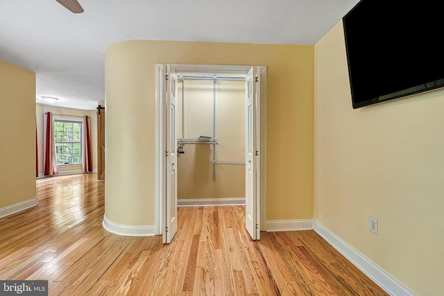 188 Byrd Point Ln, Louisa, VA 23093 - corridor featuring light wood-type flooring and baseboards