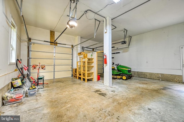 188 Byrd Point Ln, Louisa, VA 23093 - garage featuring a garage door opener