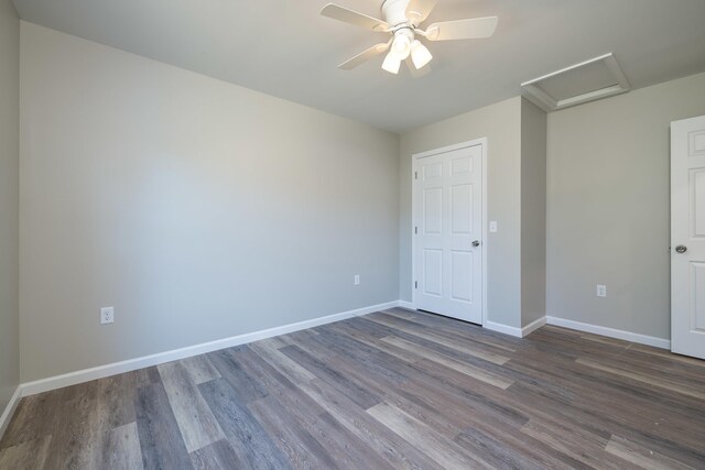 16854 E Summit Ave E, Elkton, VA 22827 - unfurnished bedroom featuring attic access, dark wood-style flooring, and baseboards