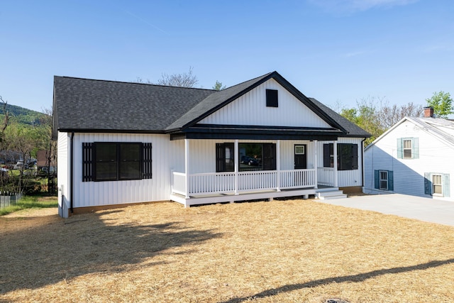 16854 E Summit Ave E, Elkton, VA 22827 - modern farmhouse style home with roof with shingles and a porch