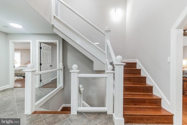 staircase with baseboards