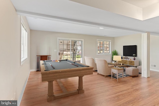 game room with light wood-style flooring, pool table, and baseboards