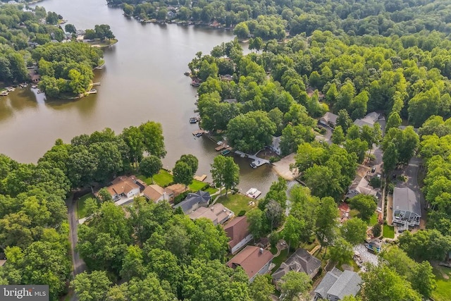 aerial perspective of suburban area featuring a nearby body of water