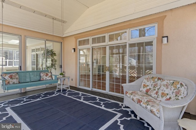 property entrance featuring stucco siding