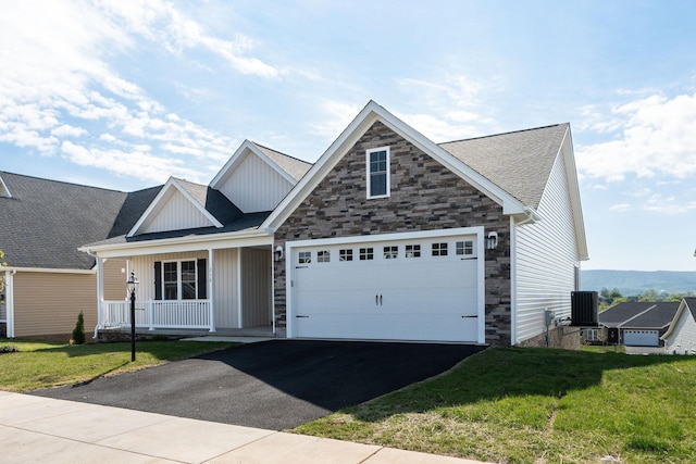 216 Spring Run Ln, Waynesboro, VA 22980 - view of front of home featuring driveway, a front lawn, an attached garage, and board and batten siding