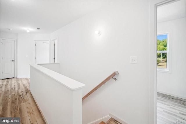 Kovi Ridge Trl, Reva, VA 22735 - hallway with an upstairs landing, light wood-style flooring, and baseboards