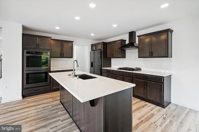 Kovi Ridge Trl, Reva, VA 22735 - kitchen with wall chimney exhaust hood, a sink, black refrigerator with ice dispenser, gas stovetop, and double oven