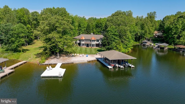 129 Lois Ln, Mineral, VA 23117 - dock area with a water view, boat lift, and a forest view