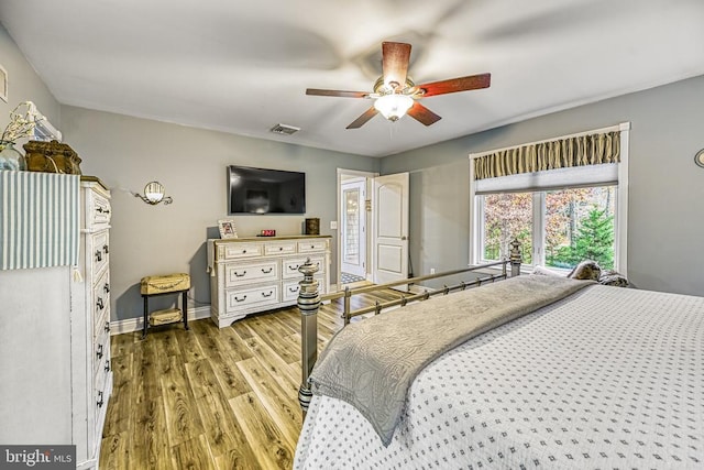 129 Lois Ln, Mineral, VA 23117 - bedroom featuring wood finished floors, a ceiling fan, and baseboards