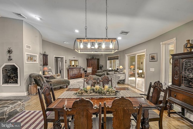 129 Lois Ln, Mineral, VA 23117 - dining area with light wood-style flooring, baseboards, lofted ceiling, and recessed lighting