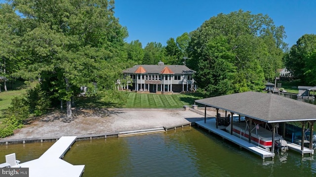 129 Lois Ln, Mineral, VA 23117 - dock area featuring a water view, boat lift, and a lawn