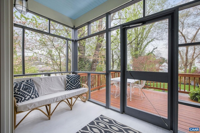 sunroom with an outdoor hangout area
