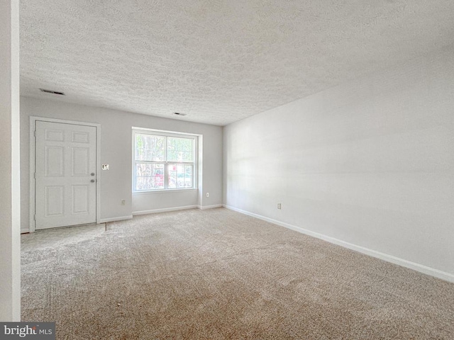 4110 Englandtown Rd, Fredericksburg, VA 22408 - spare room with a textured ceiling and carpet