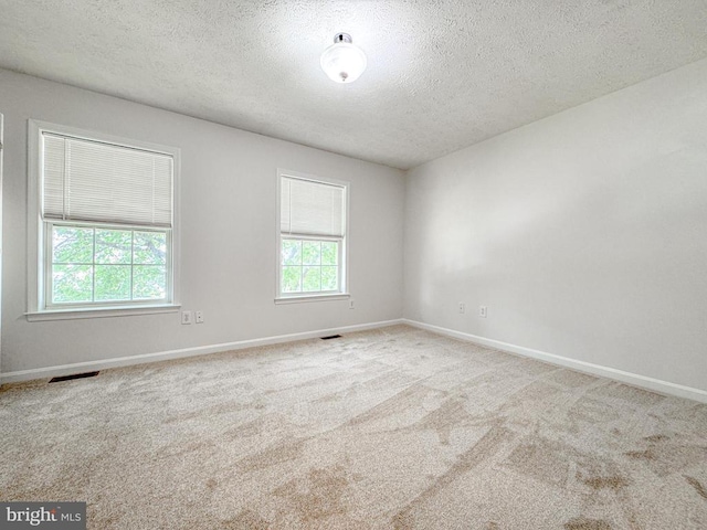 4110 Englandtown Rd, Fredericksburg, VA 22408 - carpeted spare room featuring a textured ceiling and baseboards