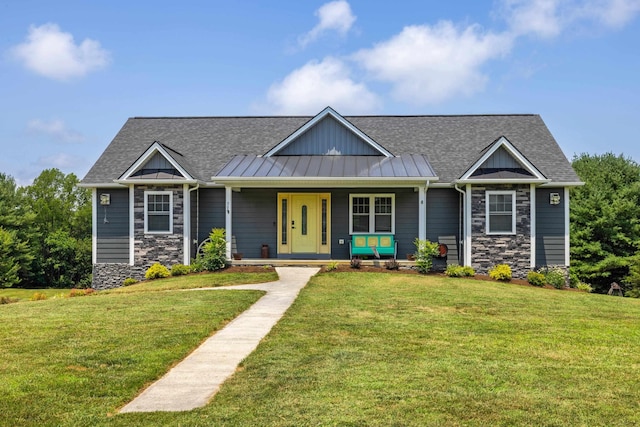 56 Serendipity Ln, Crimora, VA 24431 - view of front facade with stone siding, a front yard, covered porch, and a shingled roof