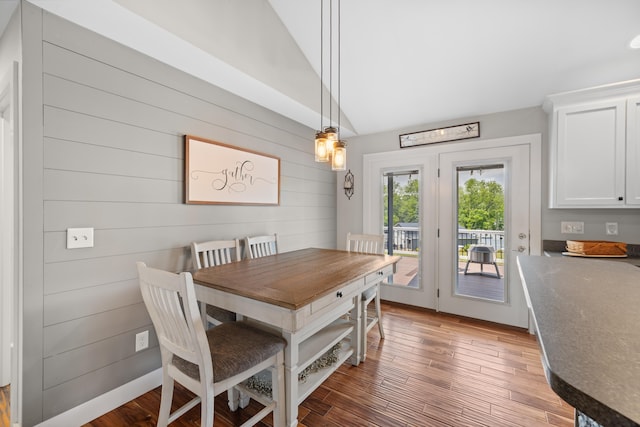 56 Serendipity Ln, Crimora, VA 24431 - dining area with vaulted ceiling, wood finished floors, and wooden walls