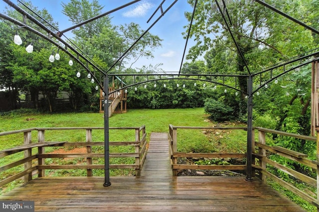295 Jackson St, Warrenton, VA 20186 - wooden deck featuring a lawn
