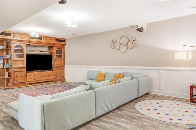 6406 Carter Ln, Mineral, VA 23117 - living area with light wood-style flooring and wainscoting